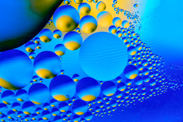 istock Abstract background with colorful gradient colors. Oil drops in water abstract psychedelic pattern image. Blue colored abstract pattern 1133535513