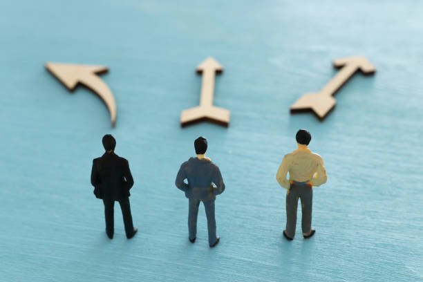 istock Businessman choosing his right way or direction, looking forward 1133536359