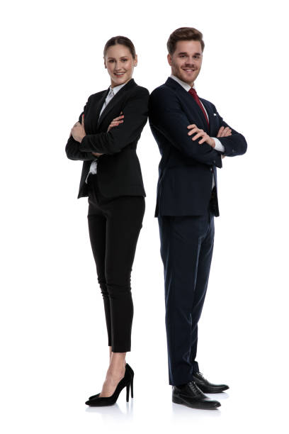 istock couple in business suits standing back to back 1133541441