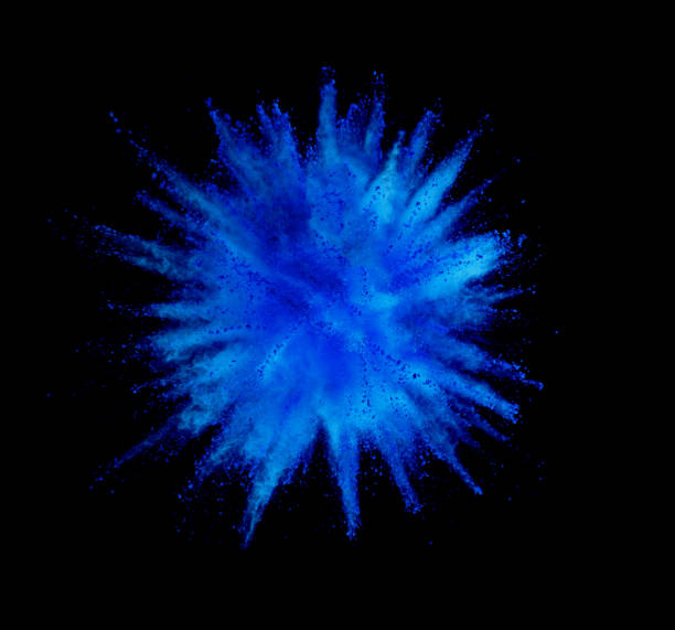 istock Explosion of blue powder on black background 1133542238