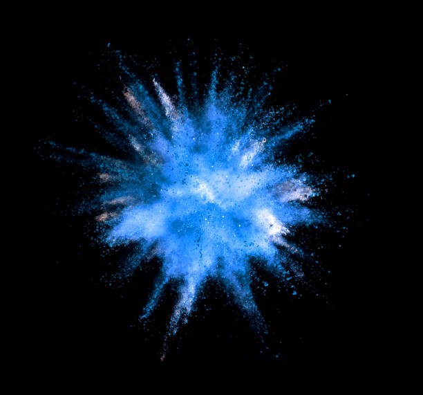 istock Explosion of blue powder on black background 1133542244