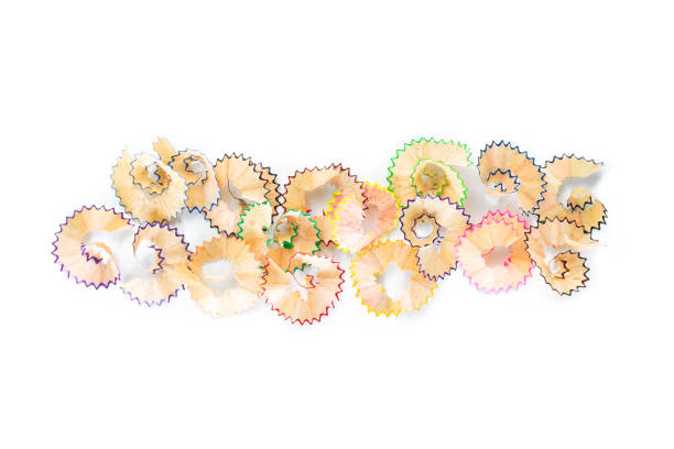 istock color pencils shavings on white background. 1133542626