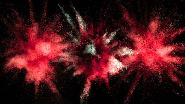 istock Explosion of colored powder on black background 1133542808