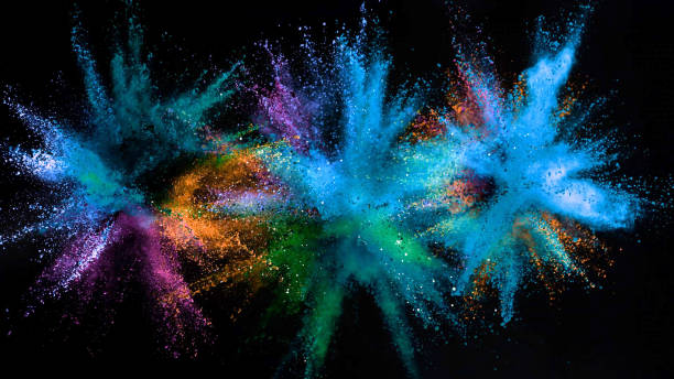 istock Explosion of colored powder on black background 1133542876