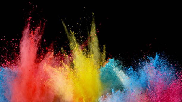 istock Explosion of colored powder on black background 1133543423