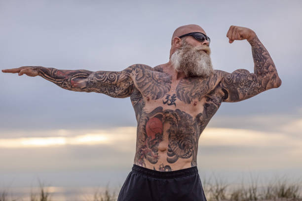istock Tattooed Senior Man During Workout 1133543539