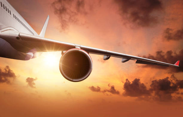 istock Commercial jet airplane flying above clouds 1133545198