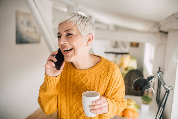 istock Happy woman using phone 1133548114