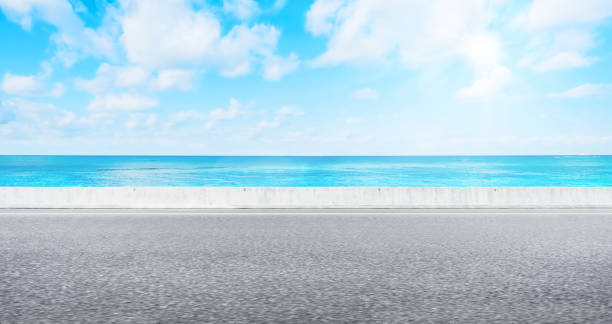 istock Empty asphalt road with sea and sky for mockup 1133548418