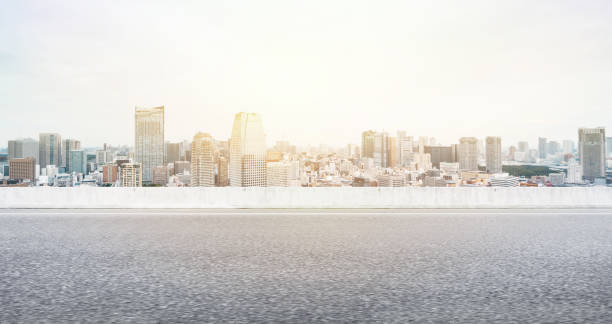istock Empty asphalt road with tokyo skyline for mockup 1133548456