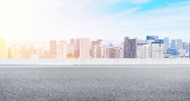 istock Empty asphalt road with tokyo skyline for mockup 1133548503