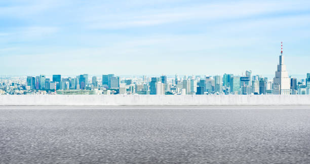 istock Empty asphalt road with tokyo skyline for mockup 1133548521