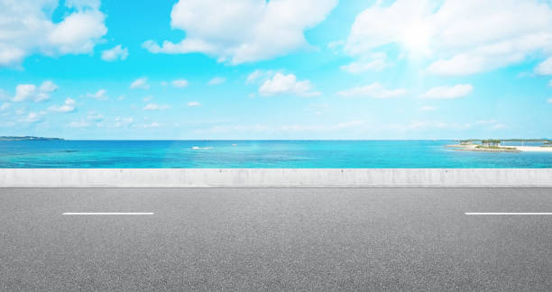 istock Empty asphalt road with sea and sky for mockup 1133548645