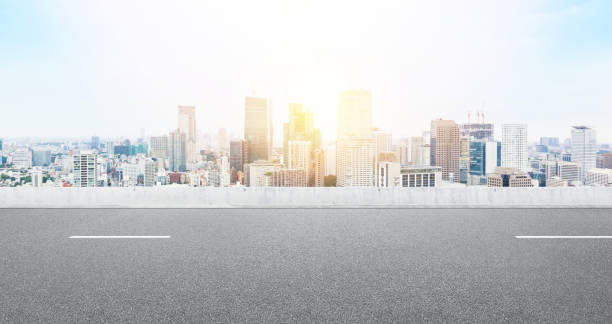 istock Empty asphalt road with tokyo skyline for mockup 1133548712