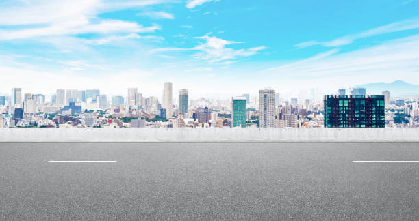istock Empty asphalt road with tokyo skyline for mockup 1133548776