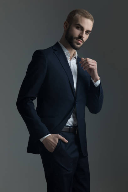 istock blonde man in suit with hand in his pocket 1133549014