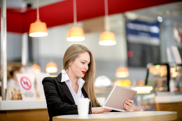 istock Young beautiful  woman working in coffee shop 1133551578