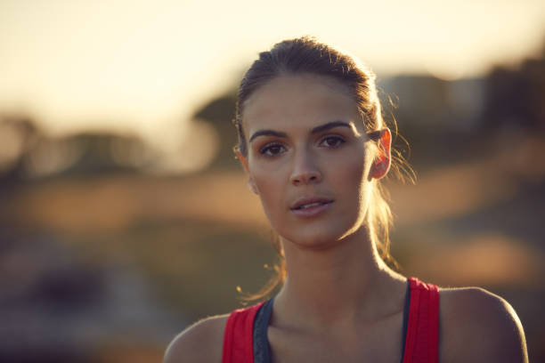 Portrait of a sporty young woman exercising outdoors