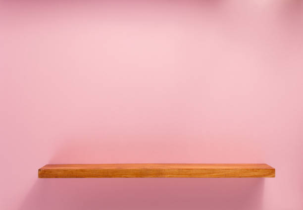 istock wooden shelf at wall plank background 1133554627