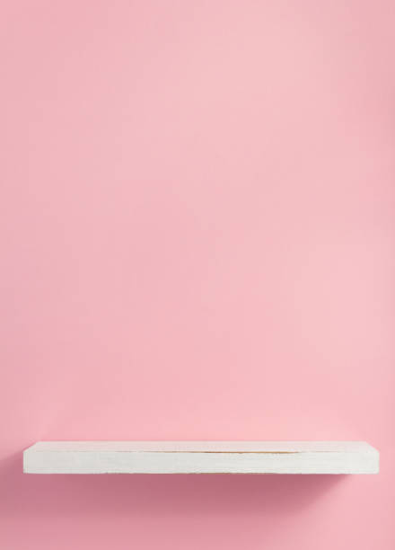 istock wooden shelf at wall plank background 1133554692