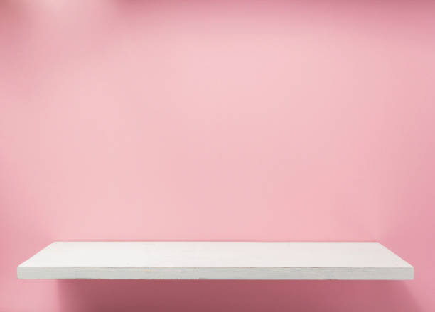 istock wooden shelf at wall plank background 1133554695