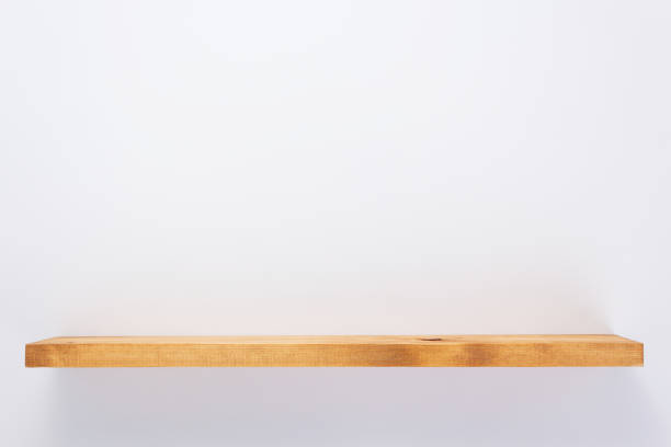 istock wooden shelf at wall plank background 1133554721