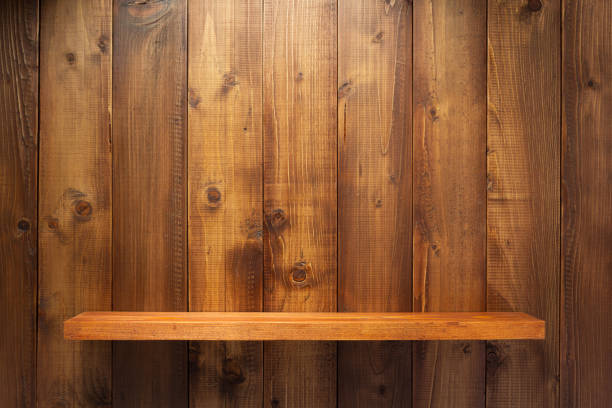 istock wooden shelf at wall plank background 1133554794