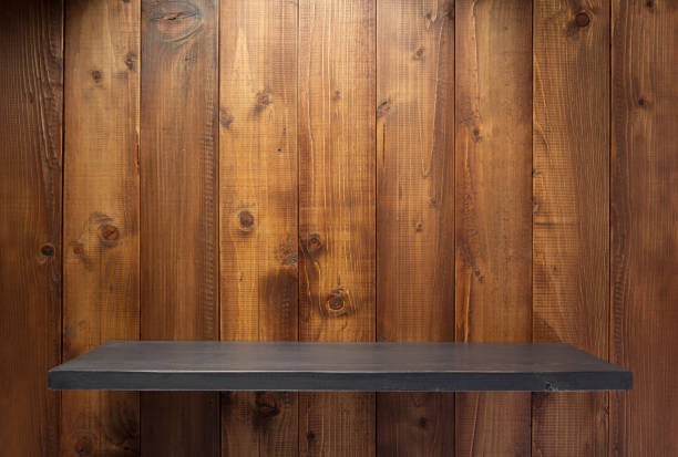 istock wooden shelf at wall plank background 1133554814