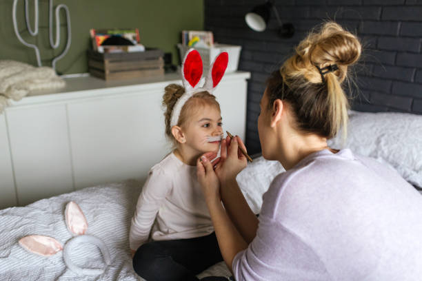 istock Face painting for little Easter bunny 1133557932