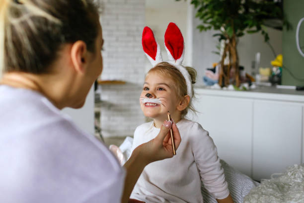 istock Face painting for little Easter bunny 1133558005