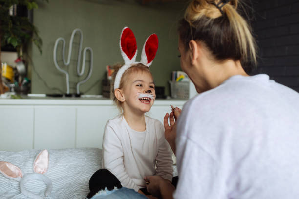 istock Face painting for little Easter bunny 1133558098