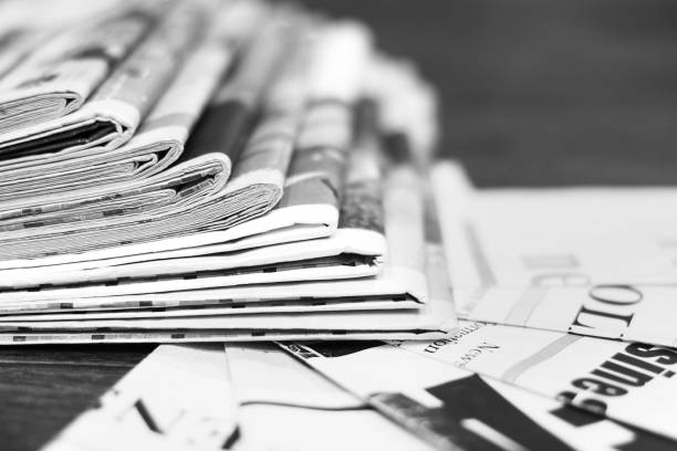 istock Newspapers and News Pages with Headlines and Articles 1133558345