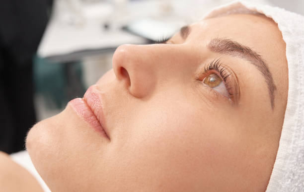 istock beautiful woman, profile view 1133559475