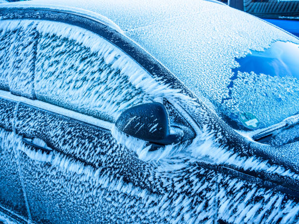 istock car with ice and frozen 1133561092