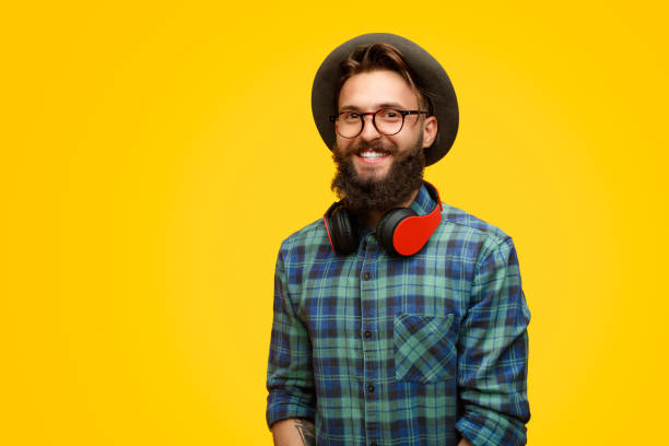 istock Happy hipster guy in headphones 1133562880