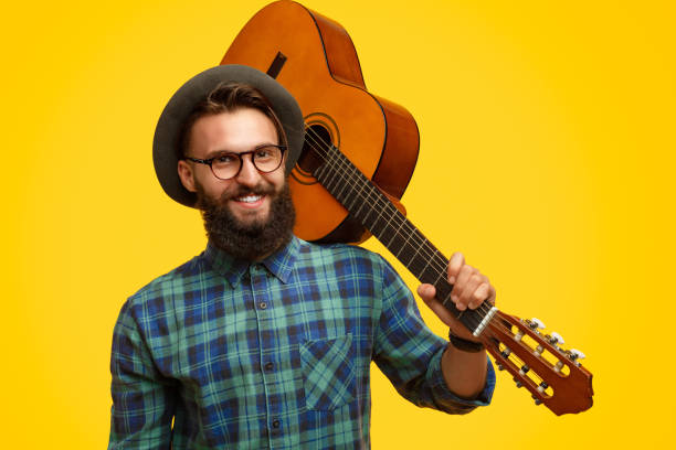 istock Smiling guy with acoustic guitar 1133562903