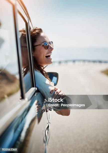 Road Trips Put Me In A Happy Mood Stock Photo - Download Image Now - Car, Happiness, Women