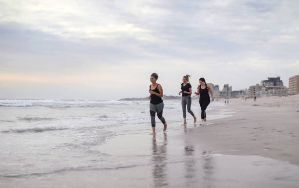 istock Three young woman exercising together. 1133563561