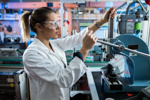 istock Female engineer working on a manufacturing machine in laboratory 1133563674