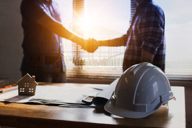 istock successful deal meeting and negotiate concept, architect or engineer shake hands with client in office 1133567821