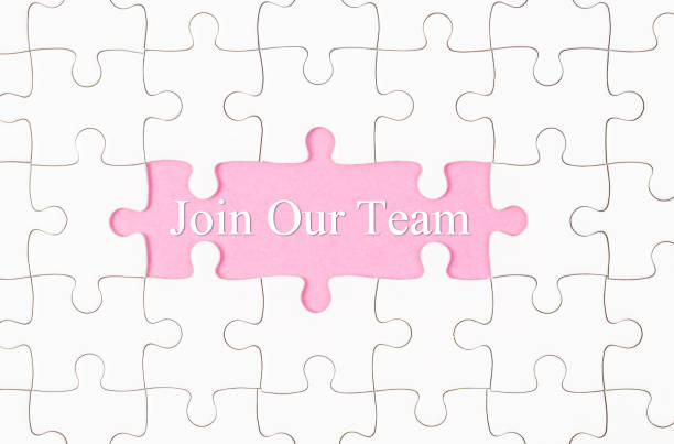 istock Join Our Team text with white jigsaw puzzle board 1133568460