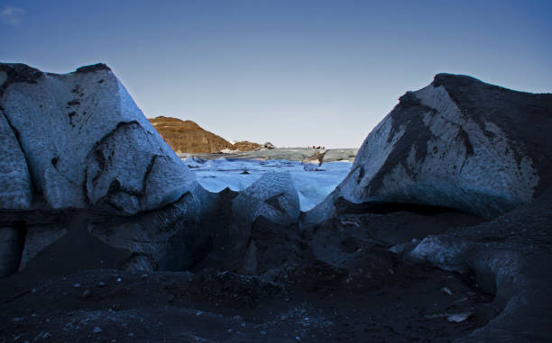 istock Huge white glacier in the background mountains 1133568851