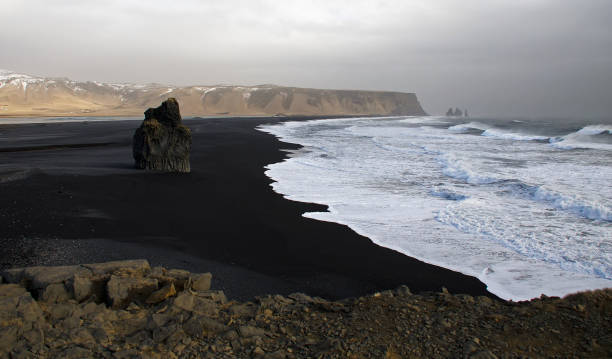 istock The Atlantic coast with black sand and huge lava rocks 1133571598