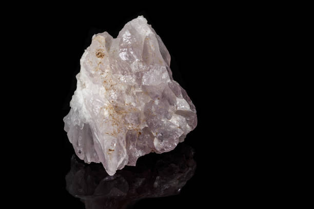 istock Macro mineral amethyst quartz stone on a black background 1133571657