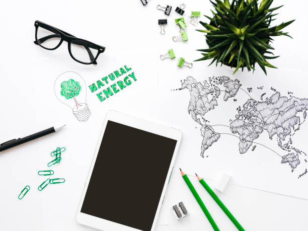 istock Business background with different office supplies and sketches and notes 1133575140