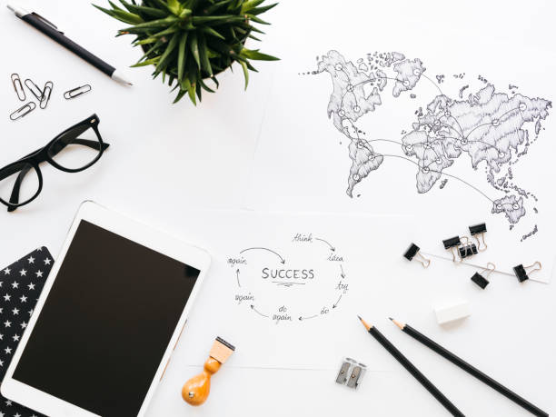 istock Business background with different office supplies and sketches and notes 1133575226