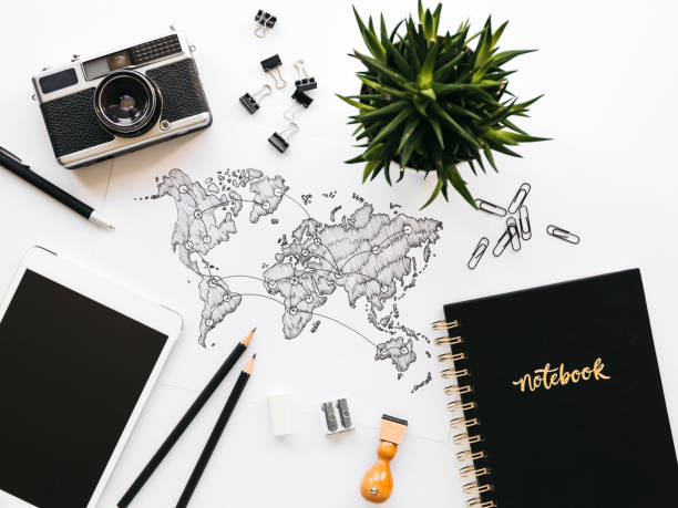 Business background with different office supplies and sketches and notes
