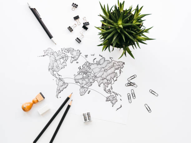 istock Business background with different office supplies and sketches and notes 1133575283