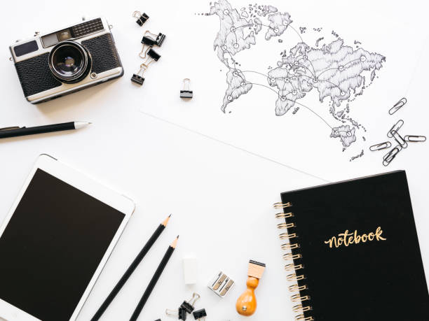 istock Business background with different office supplies and sketches and notes 1133575305