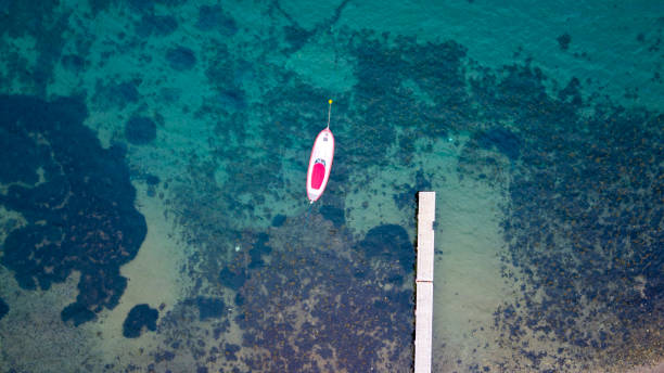istock port and fishing boat 1133577143